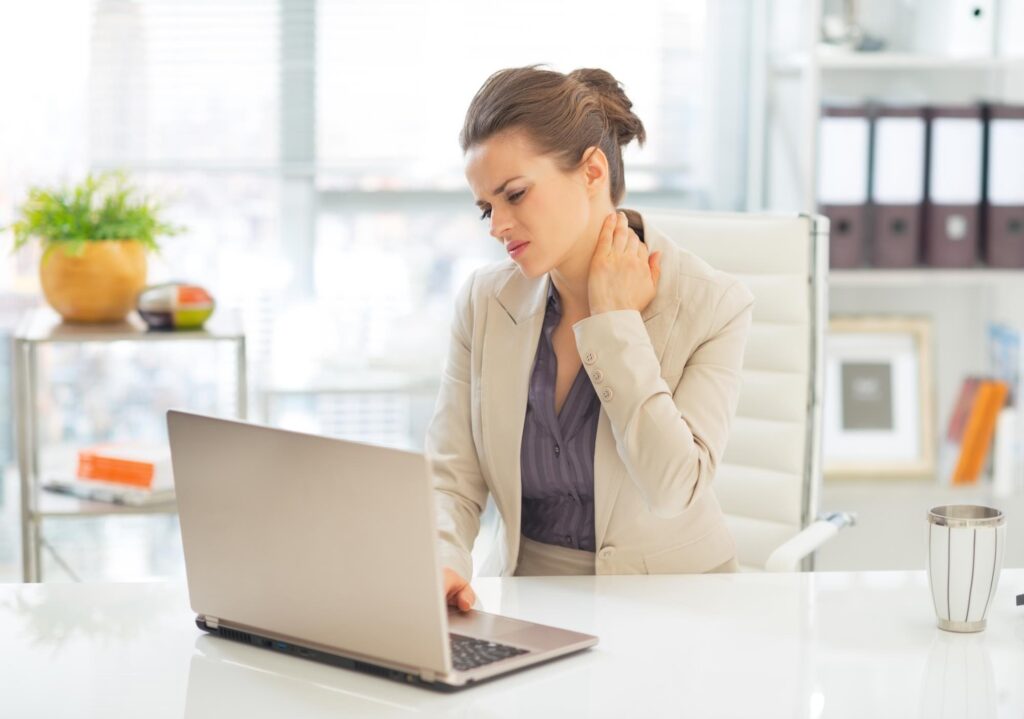 Can Cubital Tunnel Syndrome Cause Shoulder and Neck Pain woman on computer