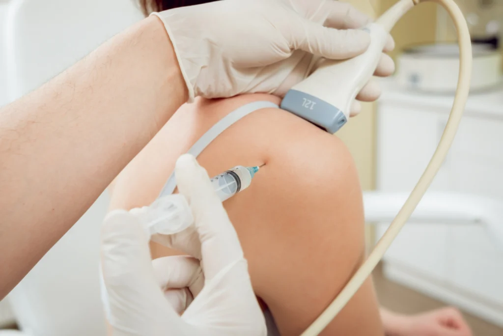 patient getting prp injection treatment
