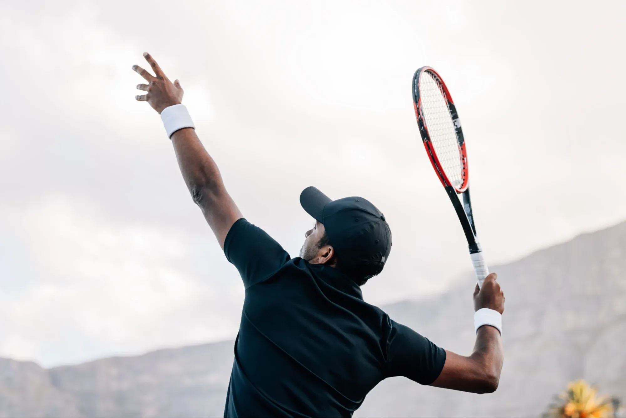 tennis athlete learning how to prevent shoulder injuries in overhead sports.